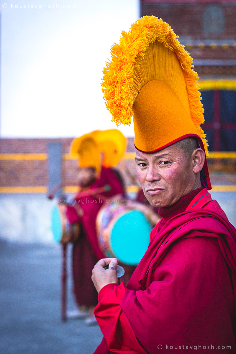 A monk waiting for the event to start in old Ralang Monastery